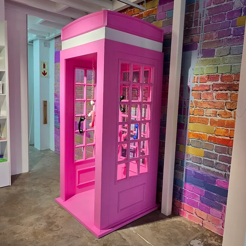 Retail shopfitting with custom display cabinetry, product shelving, and refined branded interior joinery